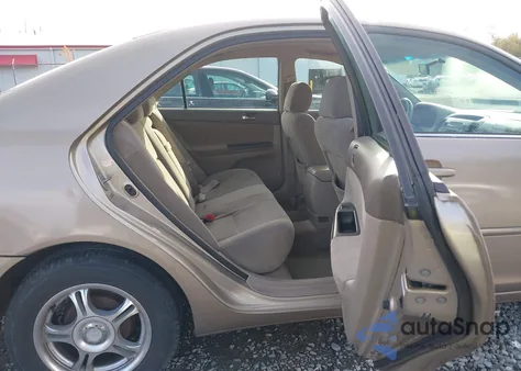 2005 Toyota Camry Le z USA, uszkodzony, nr VIN 4T1BE32K85U080394